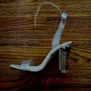 Steve Madden Size 7.5- runs small. Would work for size 7 foot. Clear heel/straps